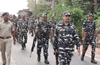 Security personnel, cops take out route march